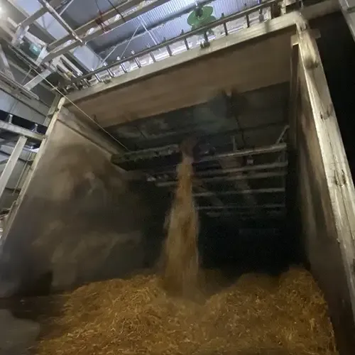 Overhead fillers loading compost into bunker